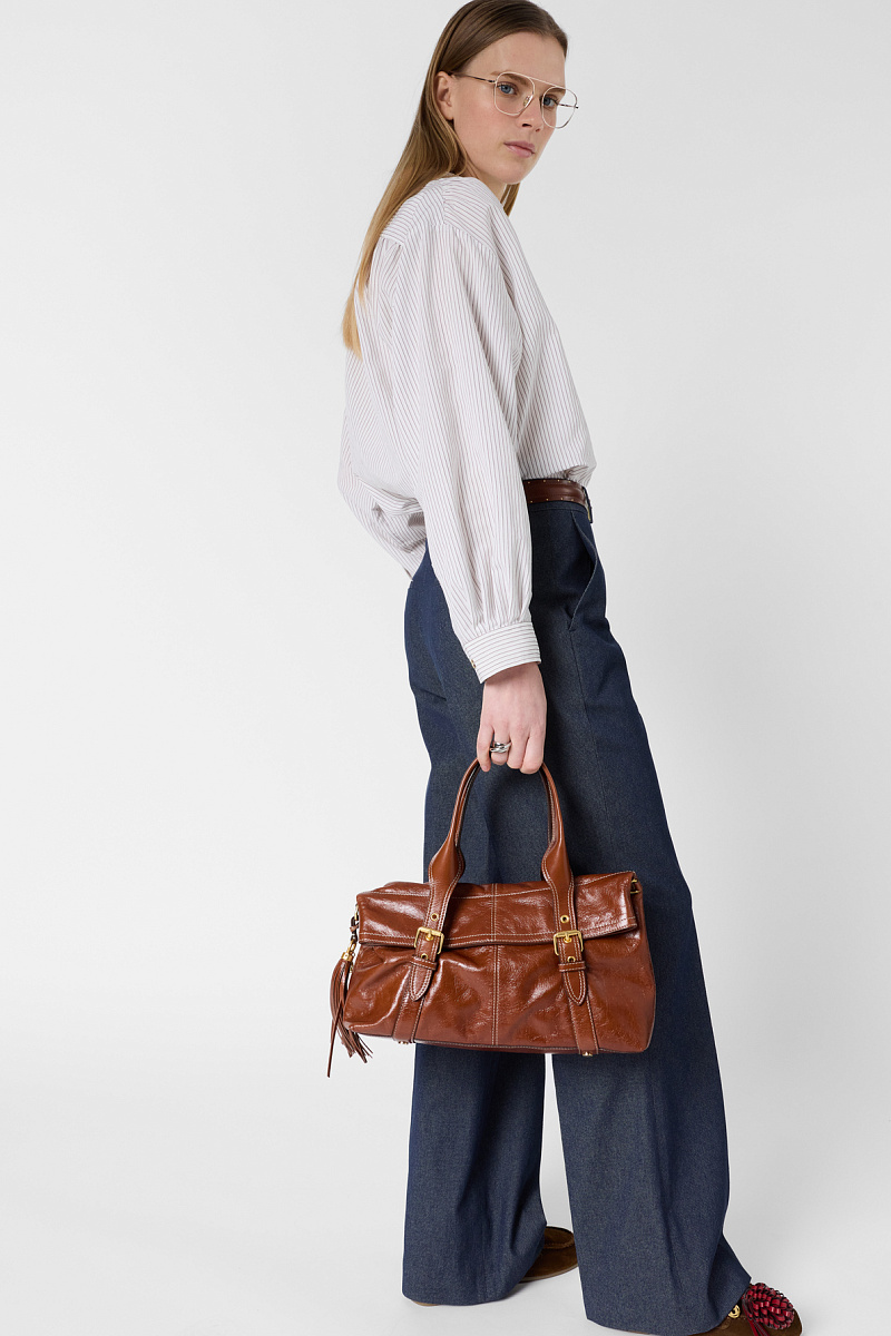 Брюки расклешенного кроя со стрелками